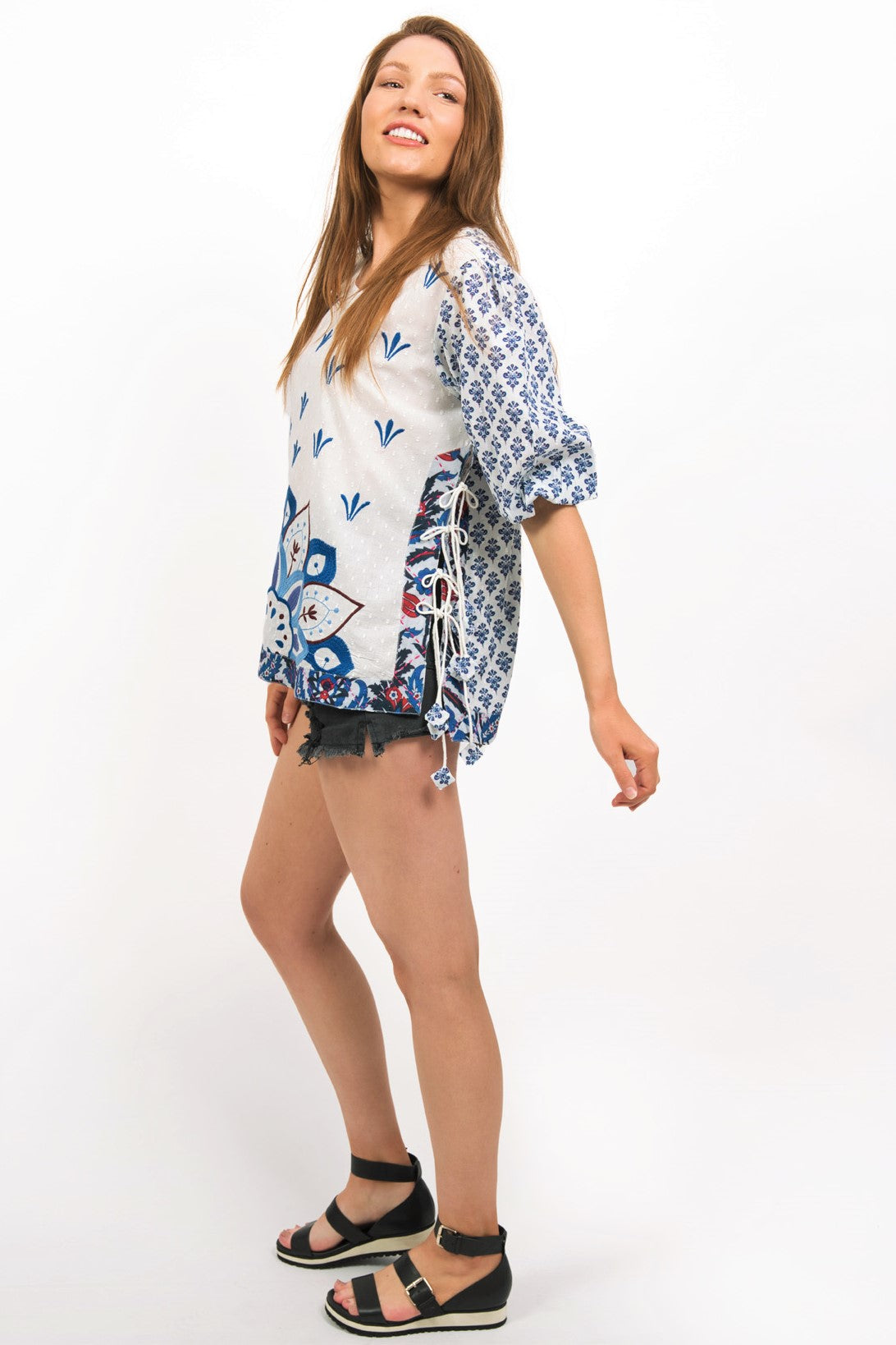 ASTRID EMBROIDERED TOP -SIDE VIEW ON MODEL SHOWING THE FRONT EMBROIDERY & PRINT ON OTHER PARTS OF THE TOP- zohaonline