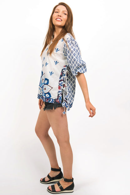 ASTRID EMBROIDERED TOP -SIDE VIEW ON MODEL SHOWING THE FRONT EMBROIDERY & PRINT ON OTHER PARTS OF THE TOP- zohaonline