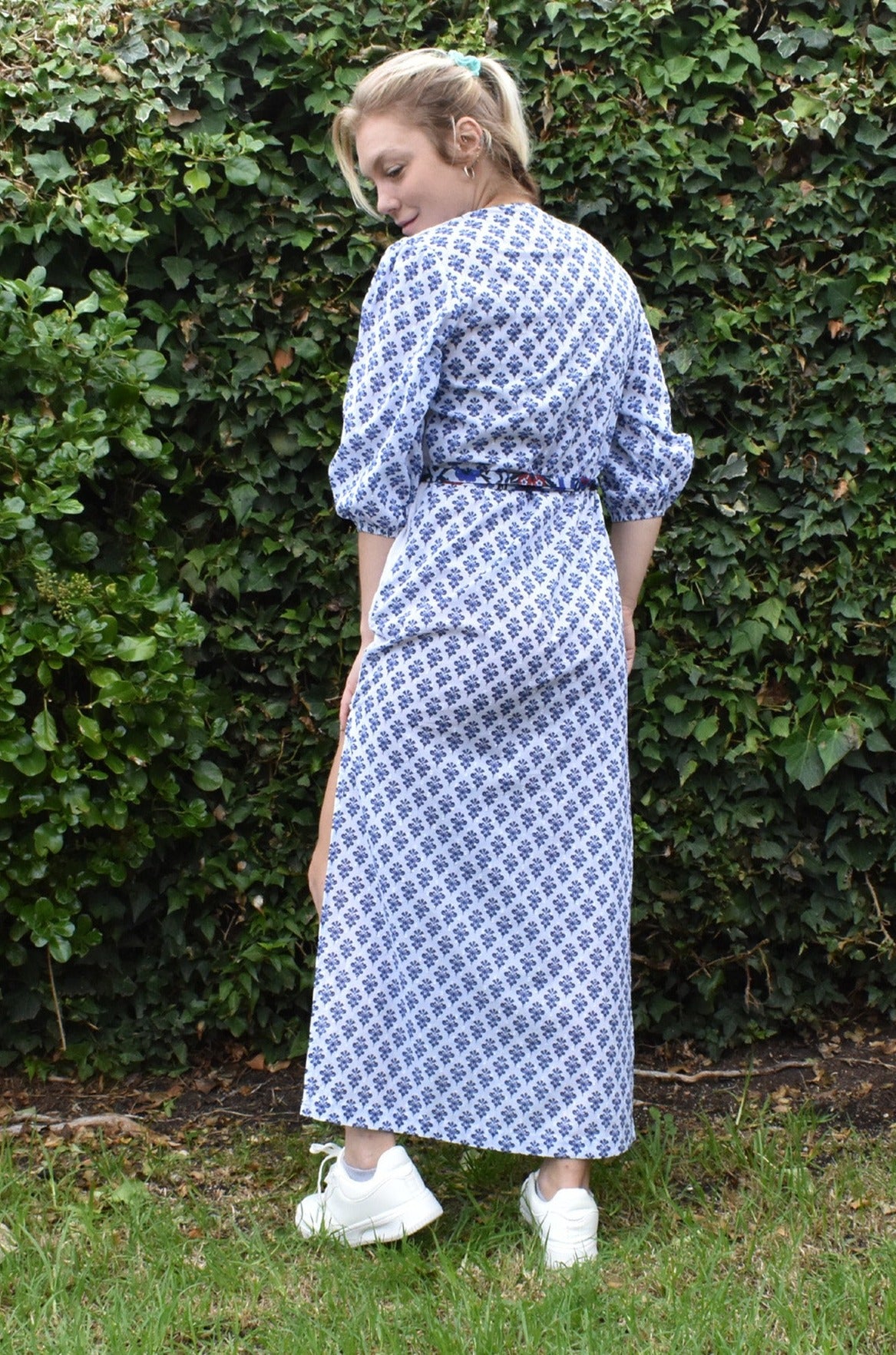 BACK PIC OF ASTRAL MAXI EMBROIDERED DRESS WORN WITH WHITE SNEAKERS - zohaonline