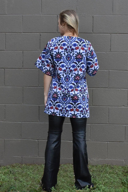 CELESTE EMBROIDERED TUNIC  BACK VIEW PAIRED WITH BLACK VEGAN LEATHER FLARE PANTS- zohaonline