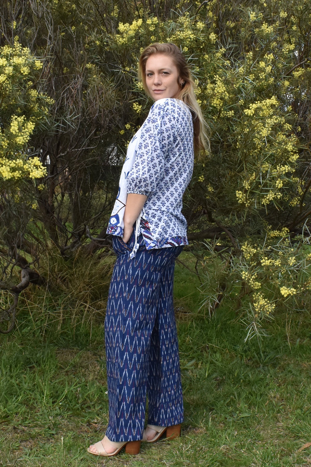 side view of the MODEL WEARING ASTRID EMBROIDERED SWISS DOTTOP  - zohaonline