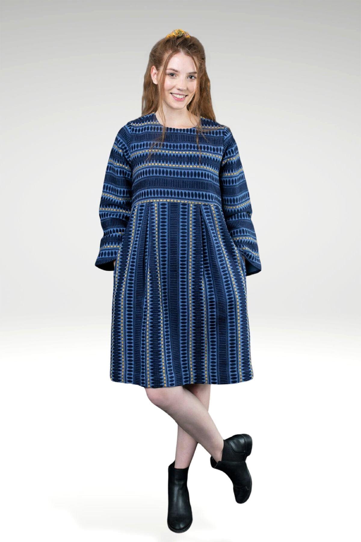 Model wearing KAITLYN KATHRYN JACQUARD  DRESS - with hands in pockets