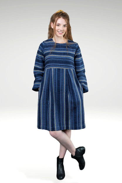 Model wearing KAITLYN KATHRYN JACQUARD  DRESS - with hands in pockets