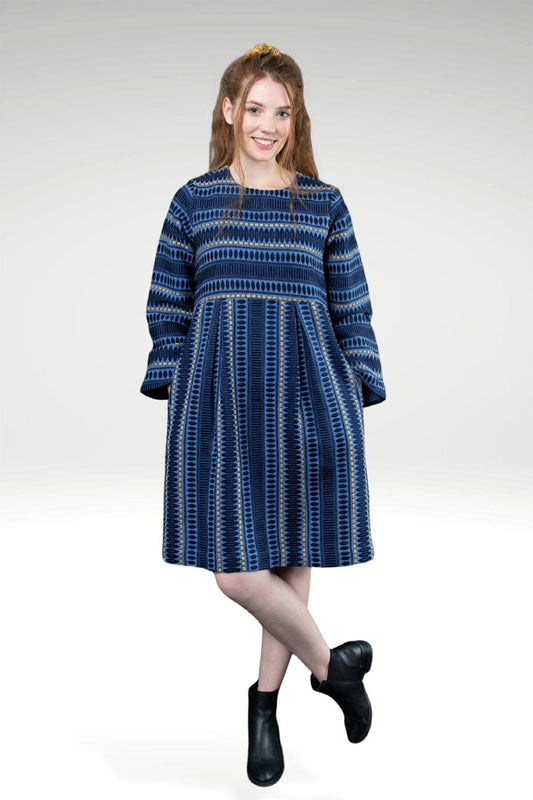Model wearing KAITLYN KATHRYN JACQUARD  DRESS - with hands in pockets