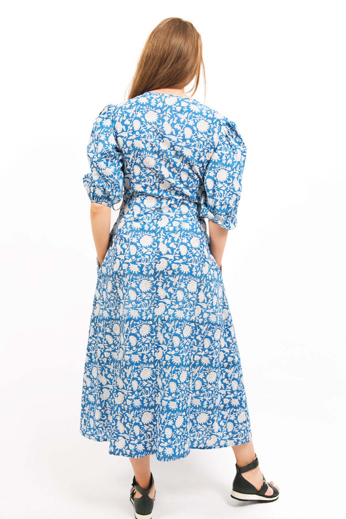 MODEL WEARING CERULEAN COLOUR OF ETHICALLY MADE ZEPHYR PRINTED WRAP MAXI DRESS - zohaonline