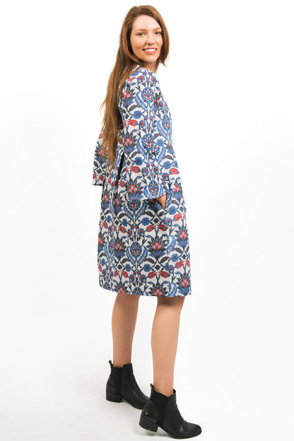 MODEL WITH HANDS IN POCKETS WEARING LUNA LUREX PRINTED FLORAL DRESS - zohaonline