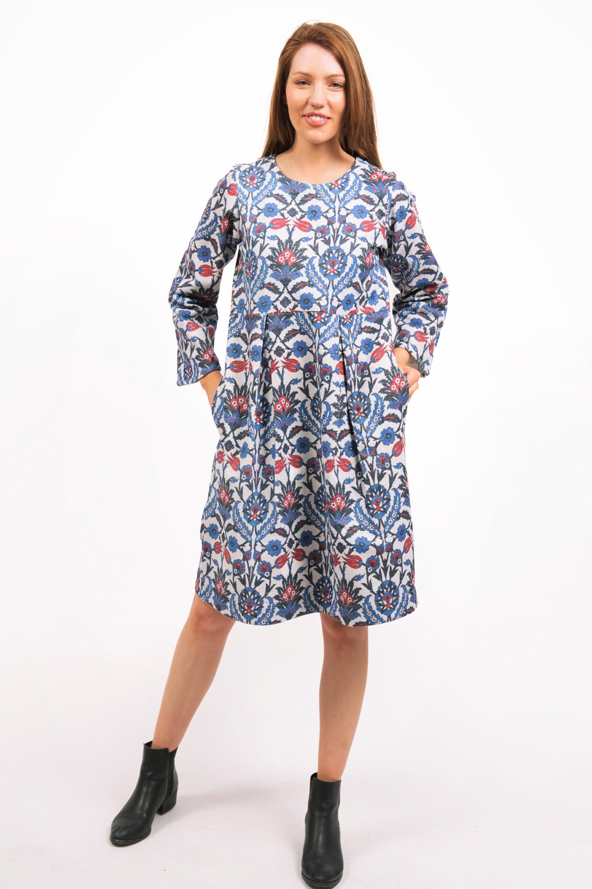 MODEL WEARING LUNA LUREX PRINTED DRESS WITH BLACK BOOTS - zohaonline